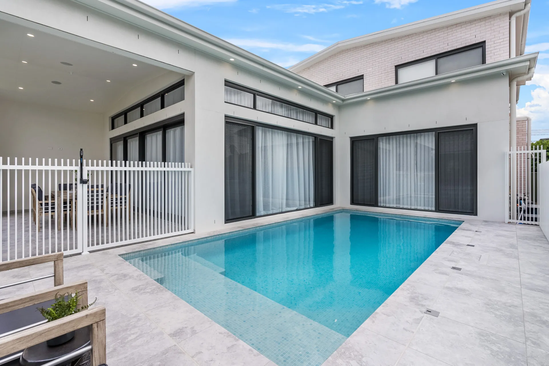 Swimming pool and rear elevation of the Scott custom home