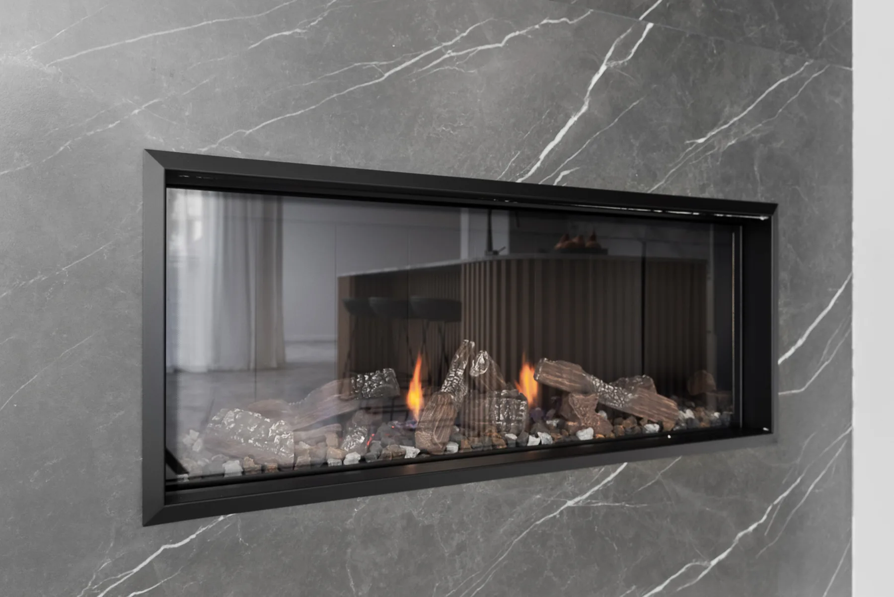 Linear gas fireplace set into a stone feature wall in the Scott home