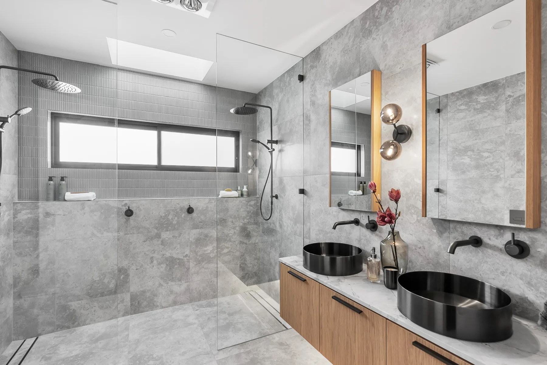 Ensuite with walk-in shower, twin black basins and timber vanity in the Scott home