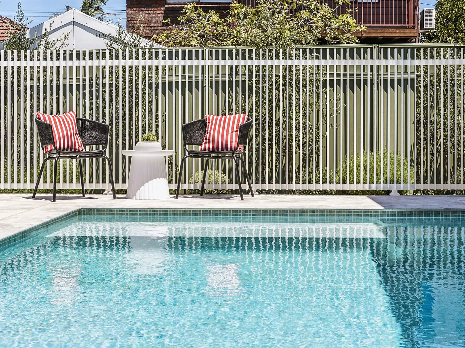 Poolside seating at the Scott home in Kogarah